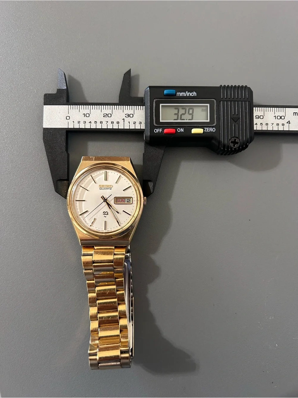 Seiko Quartz Day/Date Gold Tone Metal Bracelet Silver Dial 33mm Men’s Watch